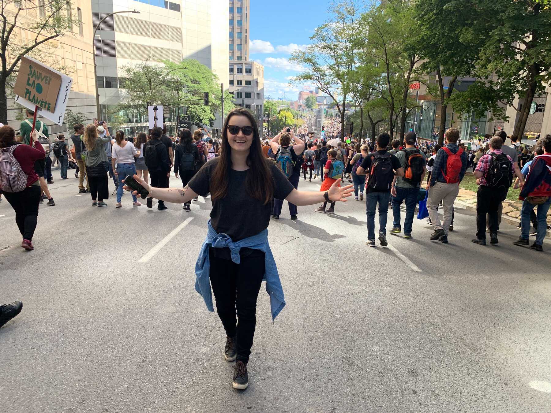 Woman smiling amid march