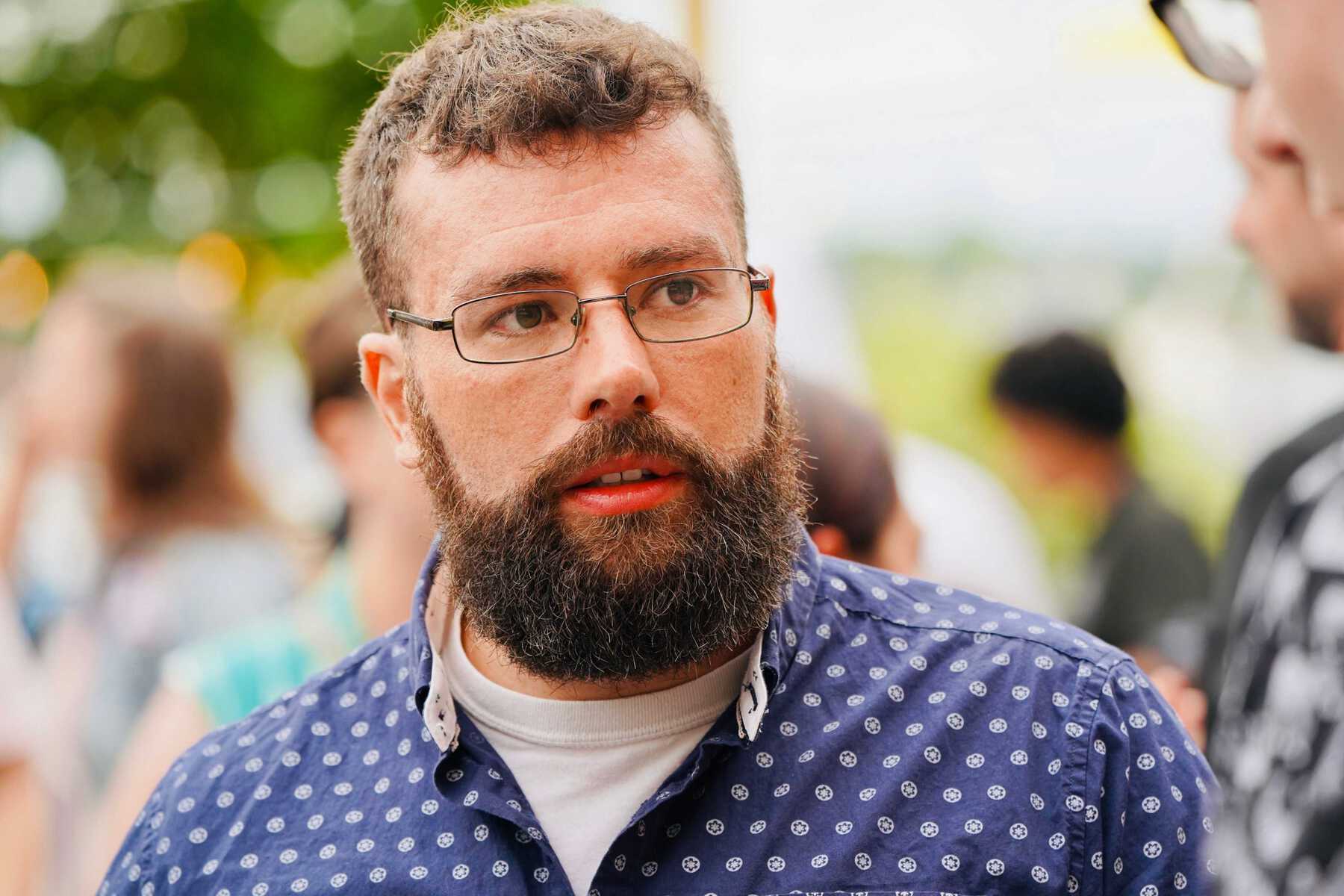 Man with beard and glasses