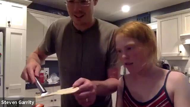 Steven and his daughter making tortillas.