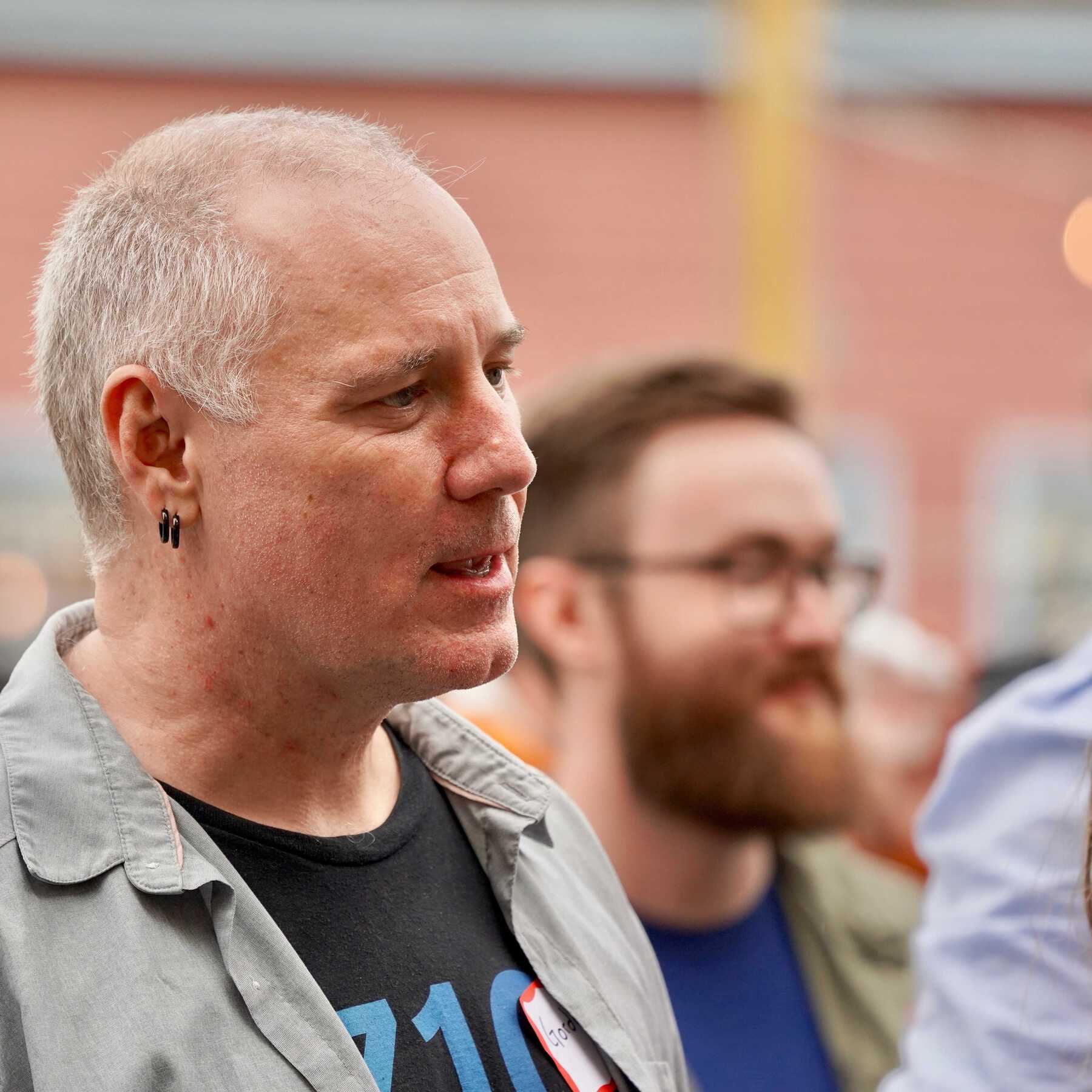 Man watching in crowd